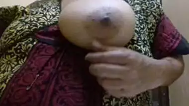 desi mom self records her boob press for her bf son gets this video from her mobile