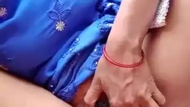 Desi girl in blue suit showing her pussy